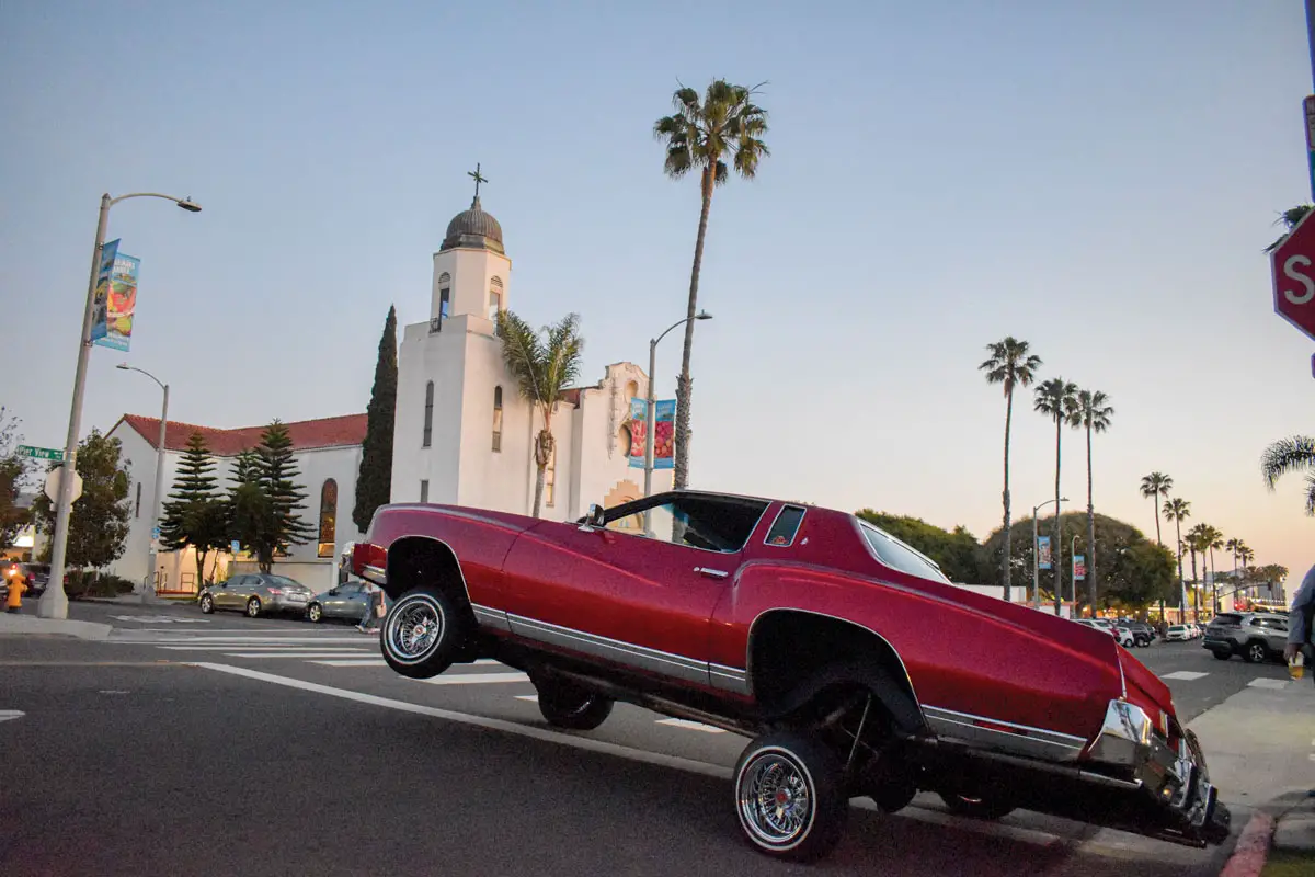 a hydraulic lowrider cruises near the Oceanside Museum of Art on May 6 for a live music event featuring local artist Dezzy Hollow. Photo by Samantha Nelson