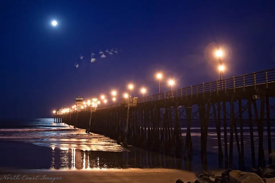 UFO or UAP: A 2014 photo reportedly depicting a bell-shaped object over the Oceanside pier by Carlsbad photographer Ann Patterson. Photo courtesy of Ann Patterson