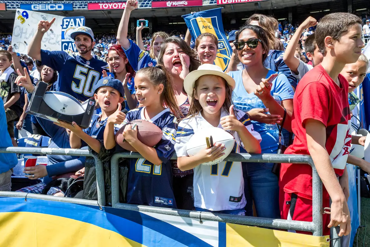 Young fans are among the nearly 18,000 who turned out at Qualcomm Stadium for the San Diego Chargers' Fan Fest in 2015. File photo/Bill Reilly