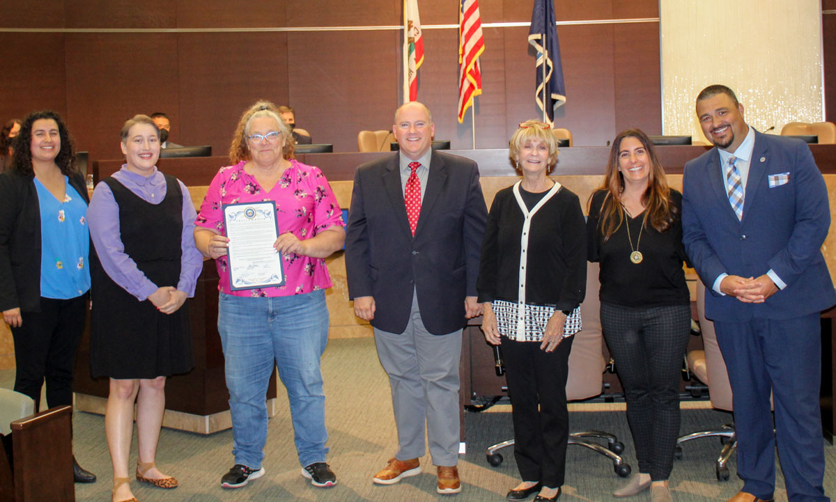 The Vista City Council with North County LGBTQ Resource Center's Leea Pronovost, third from left, and Jennifer Ianoale, second from right, at the Lesbian, Gay, Bisexual, Transgender and Queer Pride Month proclamation on June 14 in Vista. Courtesy photo