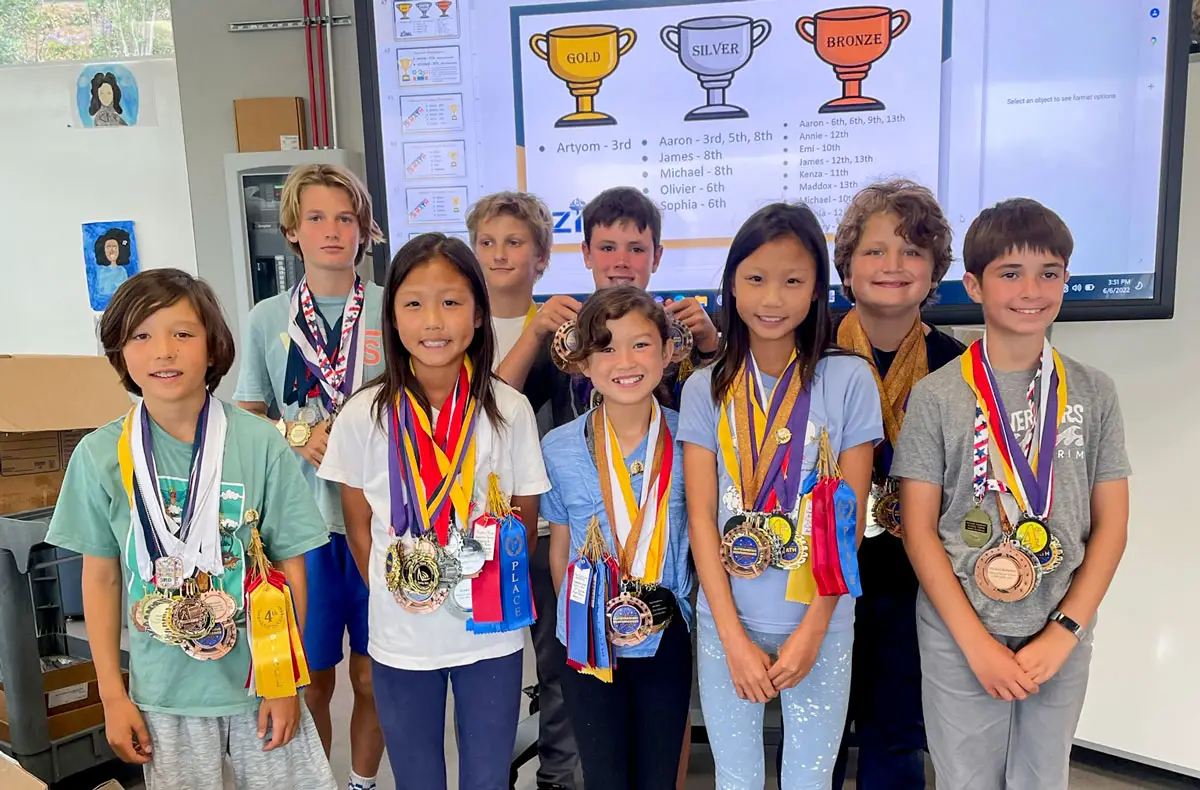 Top finishers nationally at the ZIML competition. Back row: Olivier Weeda, Artyom Sinitsyn, Zachary Ross, Aaron Cooper. Front row: James Gentile, Sophia Kim, Emi Furukawa, Annie Kim, Michael Kamenev (Not pictured: Kenza Labyed). Photo by Ilene Cooper 