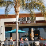 The patio at Bird Rock Coffee Roasters in Del Mar. Photo via Facebook/Bird Rock Roasters
