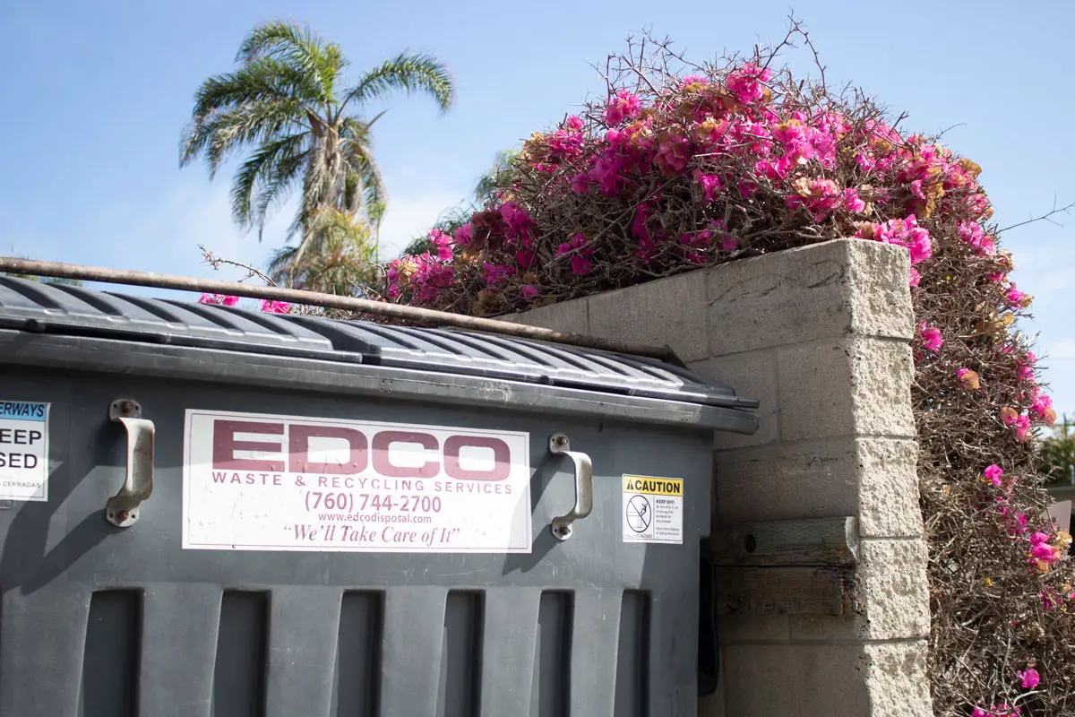 An EDCO waste bin in Solana Beach. The city approved minor increases to waste collection rates this month for both residential and commercial customers. Photo by Laura Place