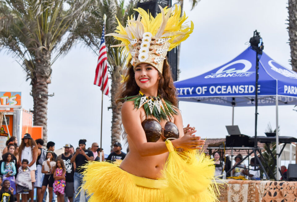Kalea Nava, 17, a dancer with Ta’utiare, a local Polynesian dance group, performs different dance styles on July 9 at the Oceanside Samoan Cultural Celebration. Photo by Samantha Nelson