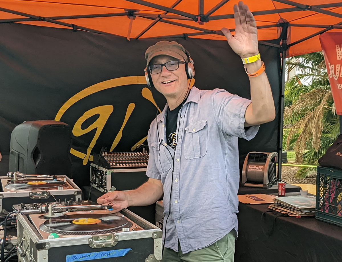 Garett Michaels, DJ and radio program director at 91X, spinning tunes at BeerX Craft Beer and Music Festival on Aug. 20 at Waterfront Park. Photo by Jeff Spanier