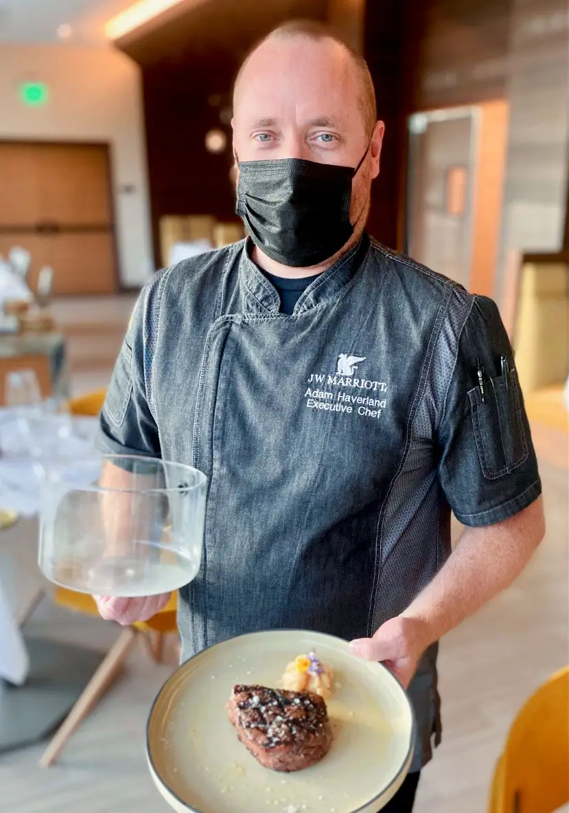 Adam Haverland, executive chef at Tocca Ferro Italian Chophouse, presents smoke-infused filet mignon. Photo by Rico Cassoni
