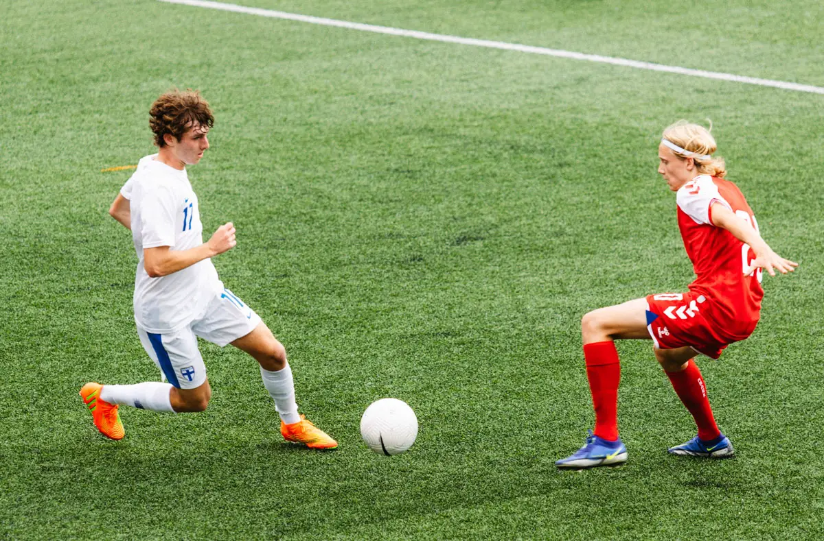 Gabriel Oksanen, left, playing for the Finland youth national team against Denmark in the Nordic Open. Photo by Jussi Oksansen