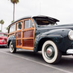Two woodies in the Moonlight Beach parking lot on Saturday, Sept. 17 at the Wavecrest Woodie Meet at Moonlight Beach in Encinitas. Photo by Jacqueline Covey