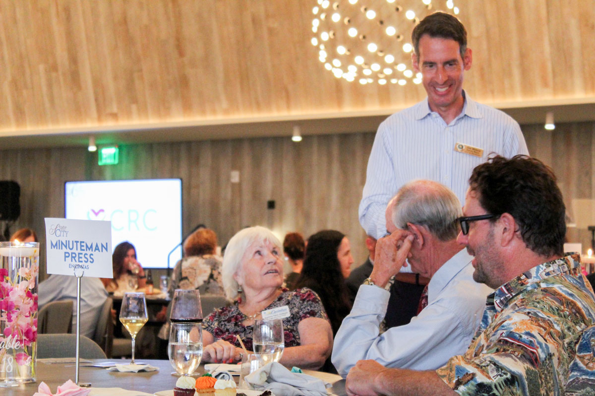 Councilman Joe Mosca speaks with business owners at the State of the City event on Sept. 1 at Alila Marea Beach Resort. Photo by Jacqueline Covey