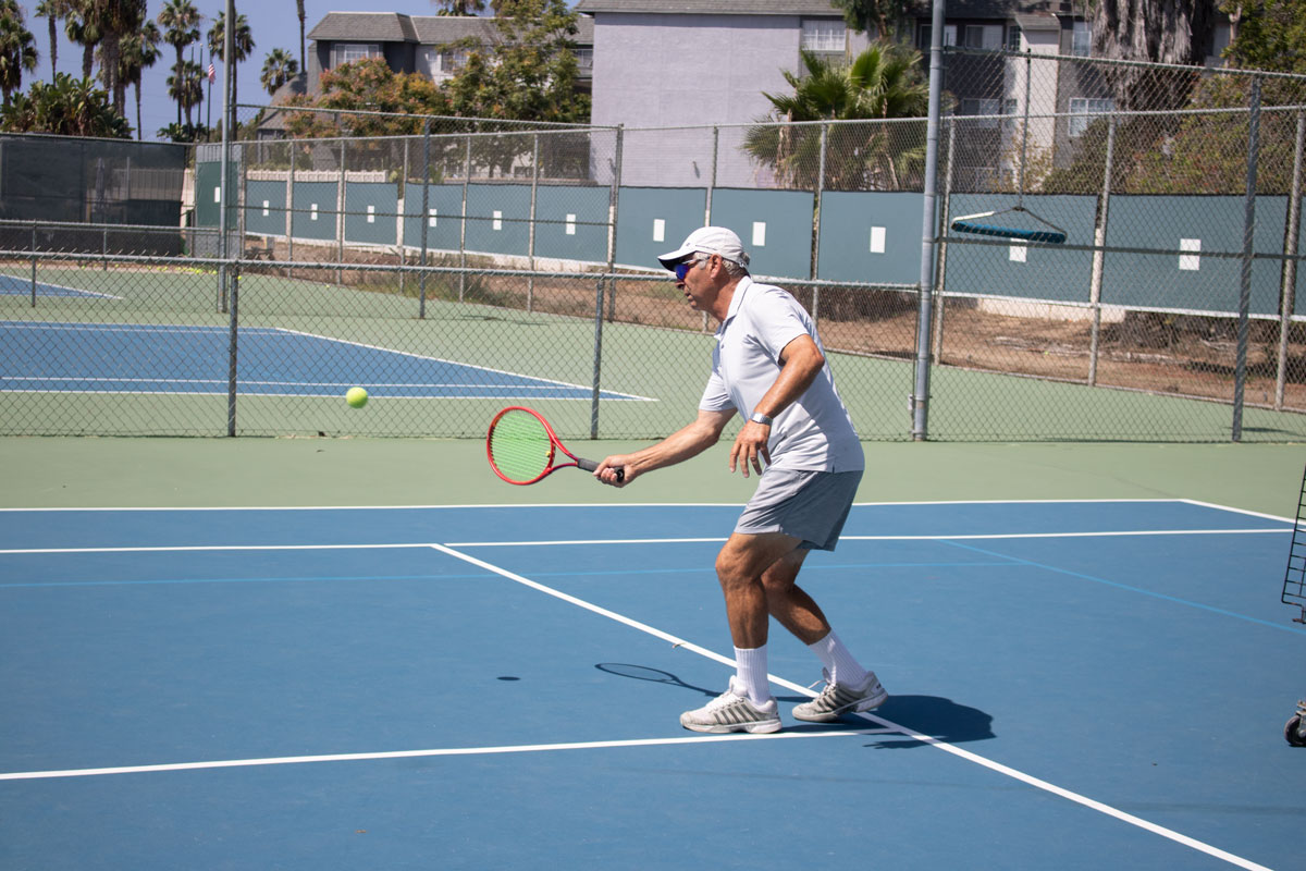 Private tennis coach Andrey Portnoy conducts a lesson at the Surf & Turf Tennis Club in Del Mar on Saturday. Photo by Laura Place