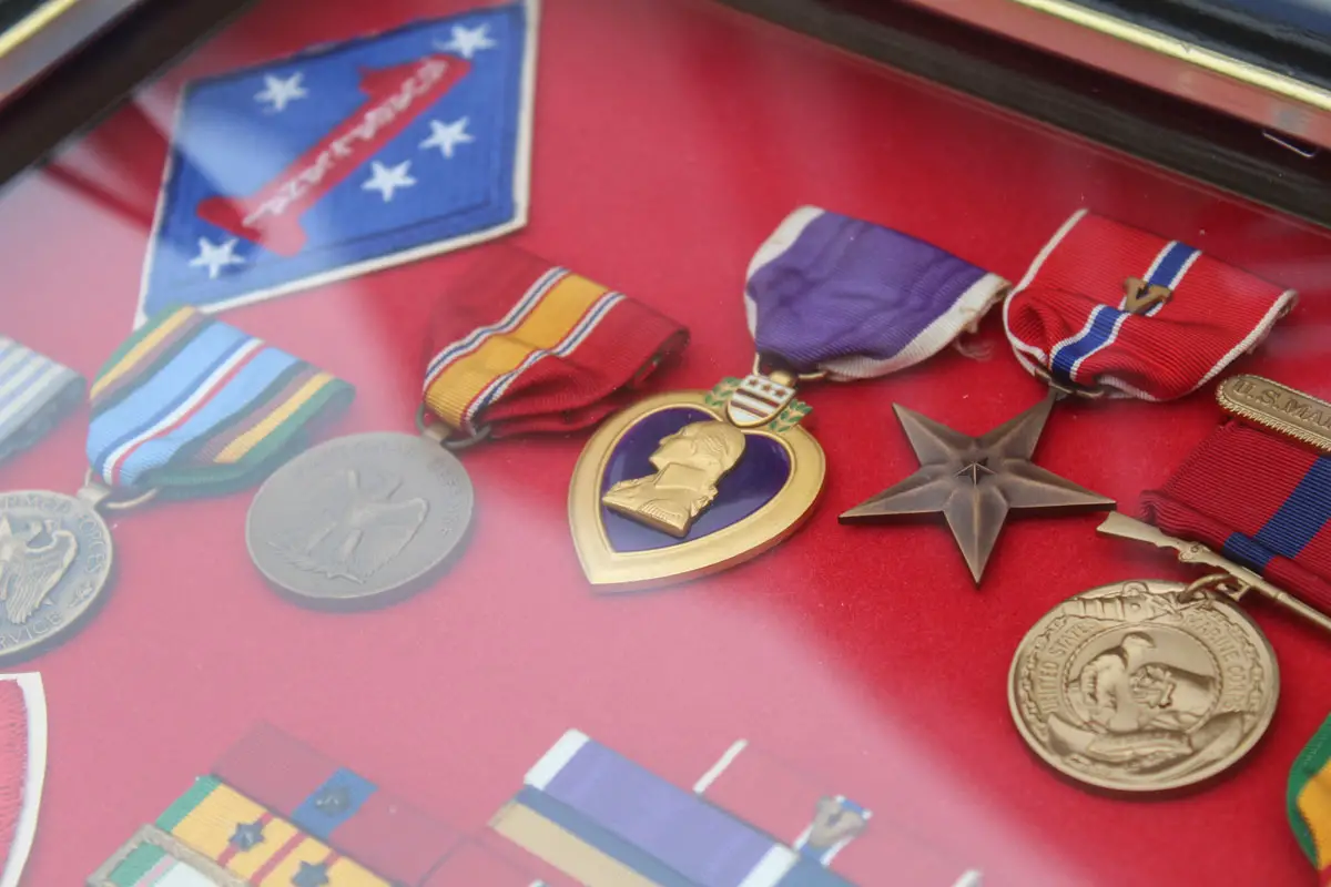 A lifetime of medals and military honors belonging to the highly-decorated 1st Sgt. Herbert Olayvar, who passed away earlier this year. Photo by Jordan P. Ingram