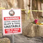 Flowers mark the location where a bluff collapse killed three family members. Courtesy photo