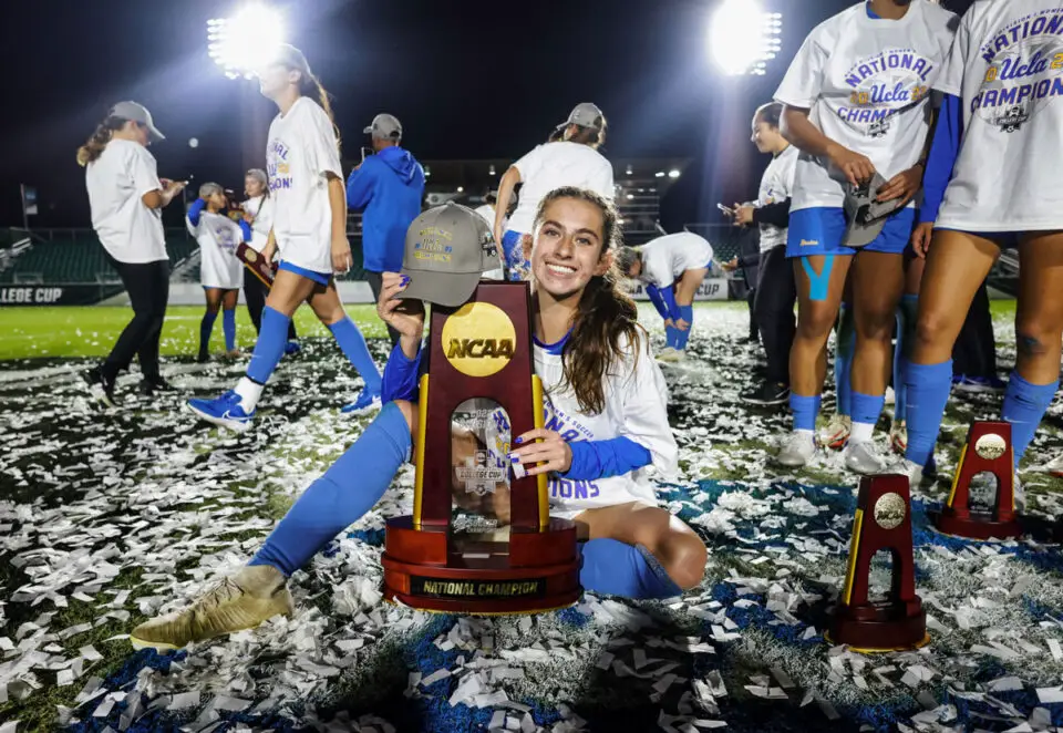 UCLA sophomore Lexi Wright, a former Carlsbad High school standout, celebrates winning the NCAA women’s soccer national championship on Dec. 5 in Raleigh, N.C. Photo by Jesus Ramirez/UCLA Athletics
