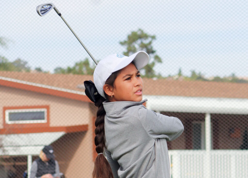Oceanside’s Saili Senteno watches her drive on Dec. 17 at the Kids Tour Fall Series Championship at Rancho Carlsbad. Photo by Steve Puterski