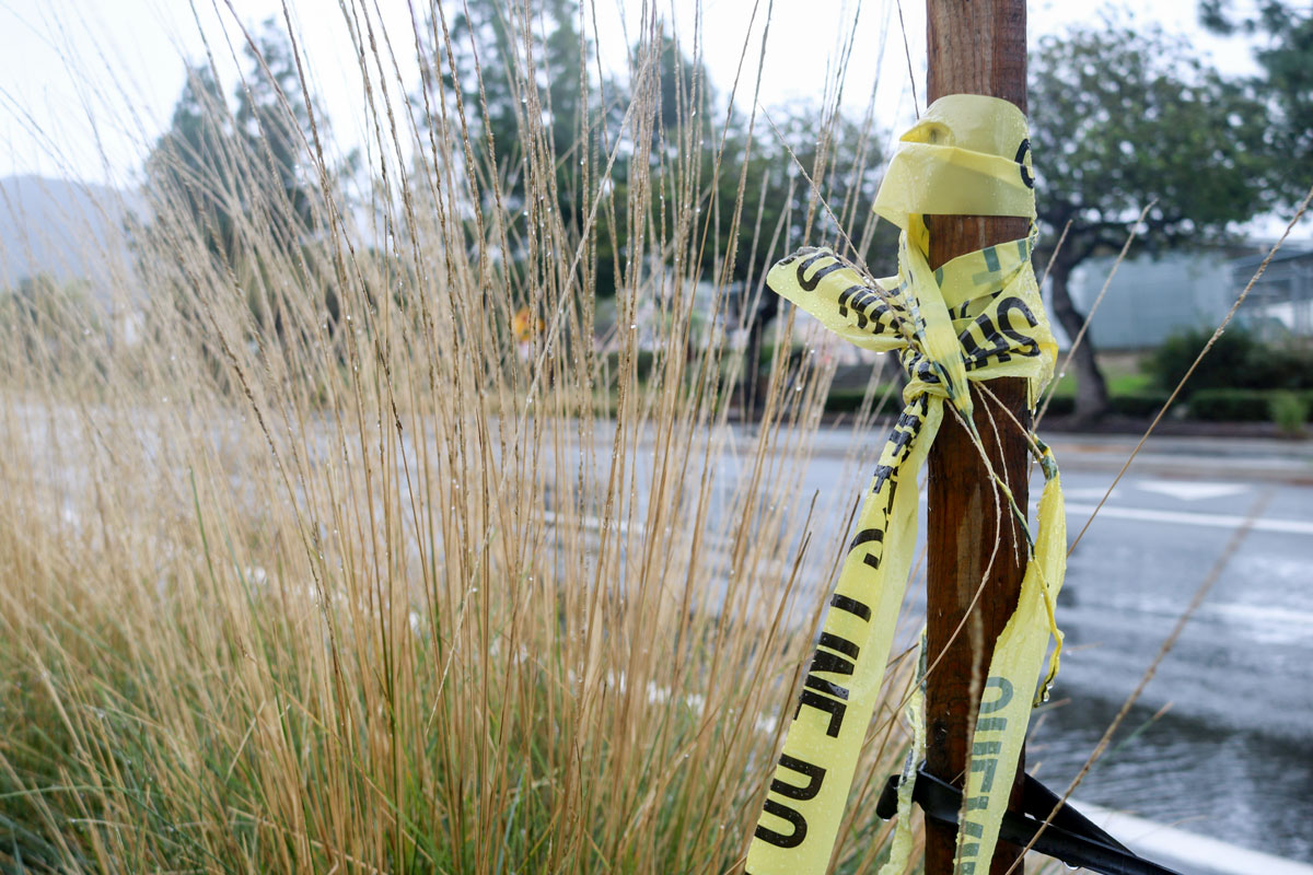 Crime scene tape is leftover along West Borden Road near Paloma Elementary SChool on Thursday, the day after a shooting that left one individual dead and another in critical condition. Photo by Laura Place