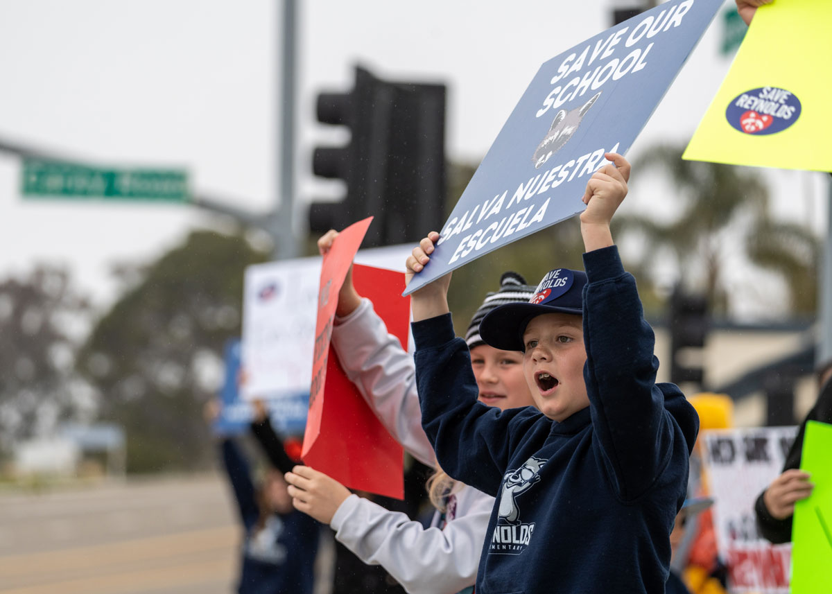 Parents and students showed up in front of the Oceanside Unified School District office on March 10 to protest the potential closure of Reynolds Elementary. The board voted to close the school a few days later on March 13. Photo by Joe Orellana