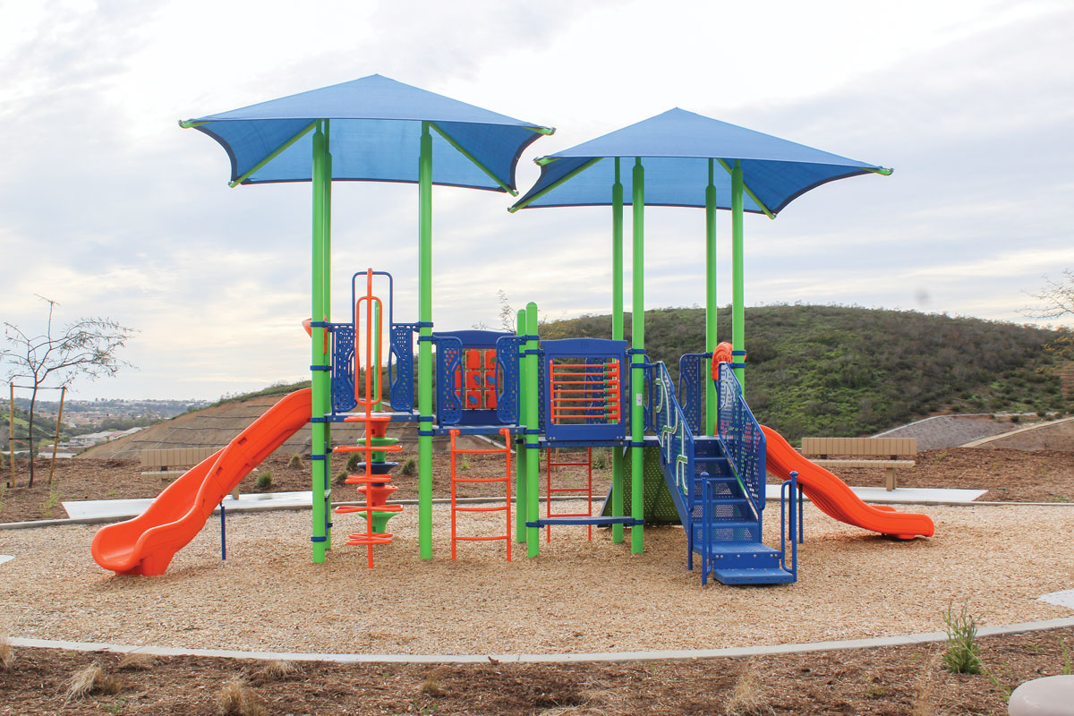 Las Abejas Park, the newest park in San Marcos located on Woodhaven Road, features a new play structure, covered picnic area, barbecues and a large grass area with a view of the hills. Photo by Laura Place