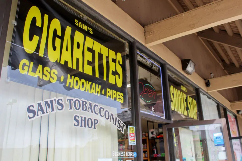 Tobacco retailers in Vista, such as Sam’s Cigar and Smoke Shop, pictured Monday, could face harsher penalties for selling tobacco to minors including increased fines and license suspension. Photo by Laura Place
