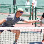 Pickleball team Andres Espinoza, left, and Ryan West-DeLuca play on a designated pickleball court on April 20 at Poinsettia Park in Carlsbad. Photo by Steve Puterski