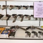 If signed into law, SB 417 would require new signage in gun stores statewide. Stock photo