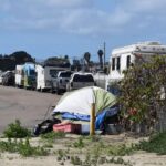 Homeless encampments located along Roymar Road right behind Brother Benno's in Oceanside. Photo by Samantha Nelson