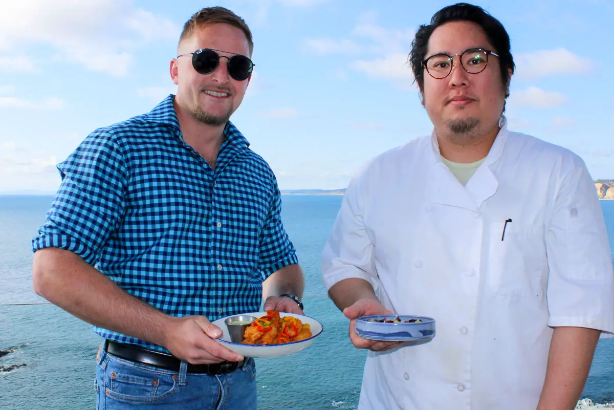 (Left to Right) George’s at the Cove Assistant General Manager David Cunningham and Executive Chef Masa Kojima on the Ocean Terrace. Photo by Rico Cassoni