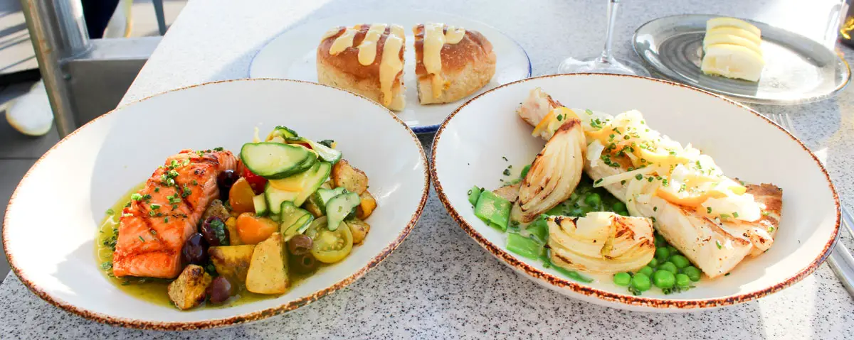 (Left to Right) Sashimi style local tuna , house made focaccia bread, and crispy shrimp. Photo by Rico Cassoni