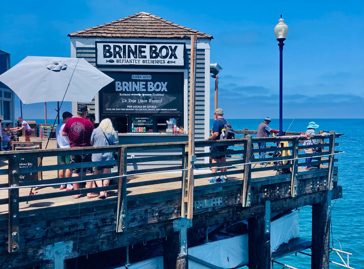 Brine Box is located at the end of the historic Oceanside pier. Photo by David Boylan