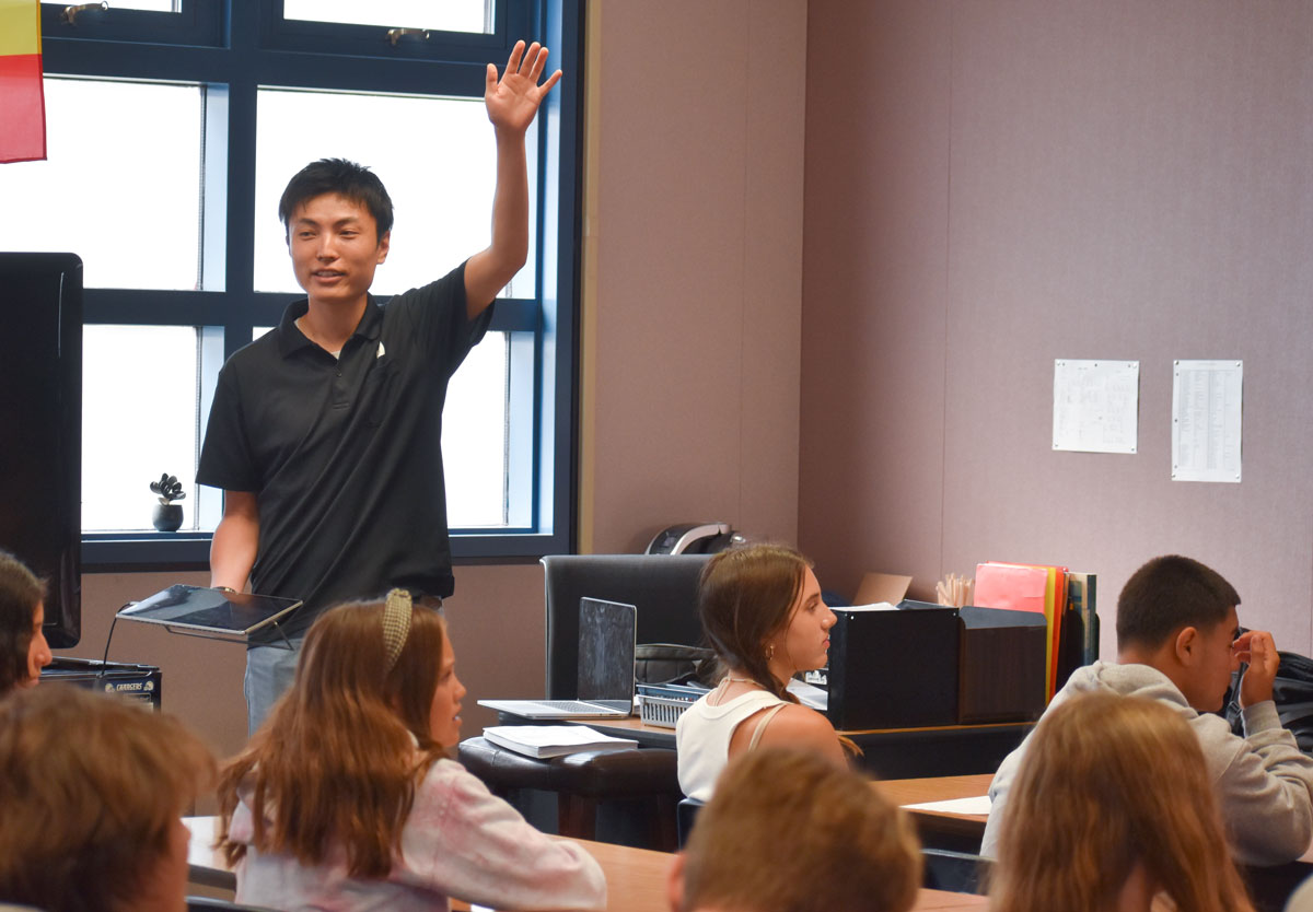Mizuho Ono teaches King Middle School students how to make origami. Photo by Samantha Nelson
