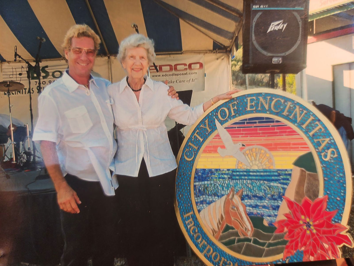 Terry Weaver and his mother presenting the city of Encinitas mosaic seal he created years ago. Courtesy photo