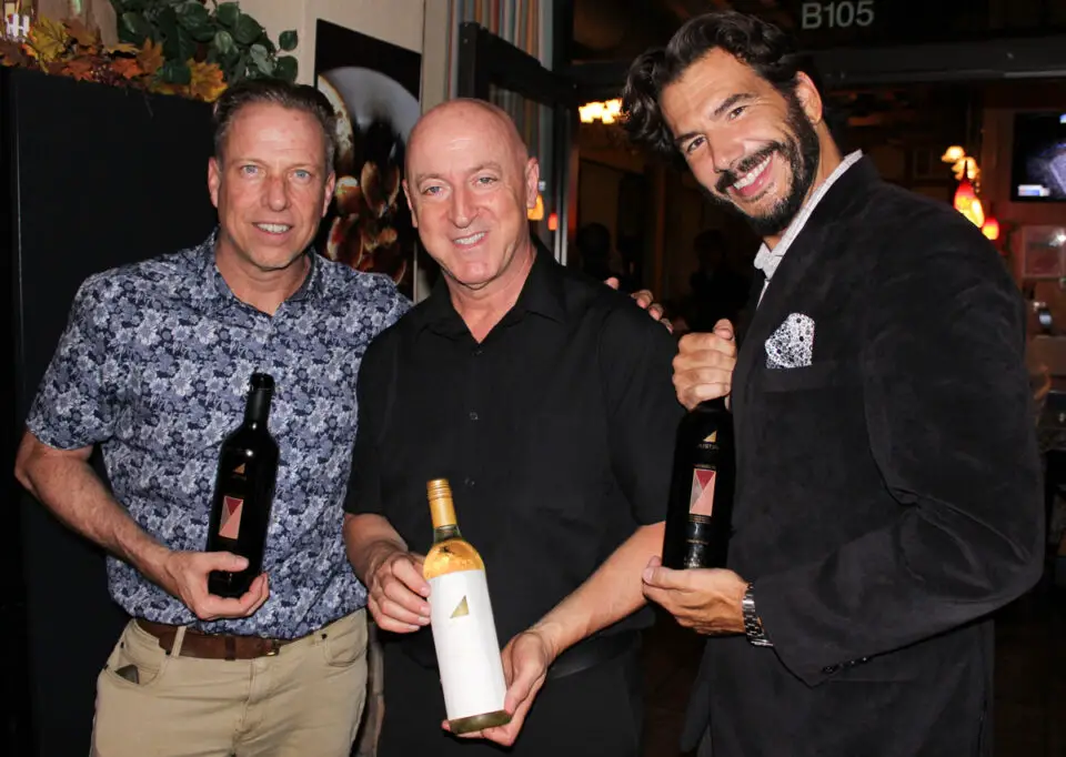 Victor Magalhaes, owner of Vittorio’s Italian Trattoria, center, with Southern Glazer's David Sheline (left) and Eric Brehm. Photo by Rico Cassoni