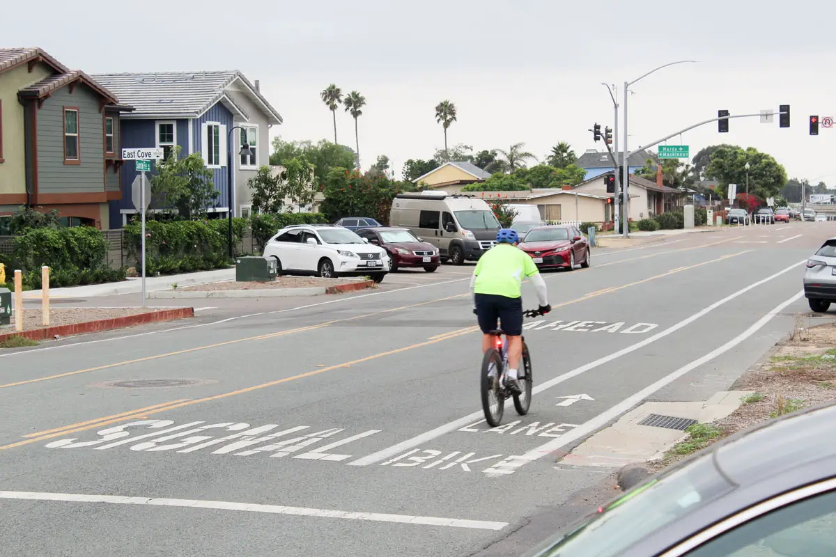 A cyclist rides west along Santa Fe Drive on Sept. 21. Lanes currently separated only by a white line will soon become protected lanes. Photo by Laura Place