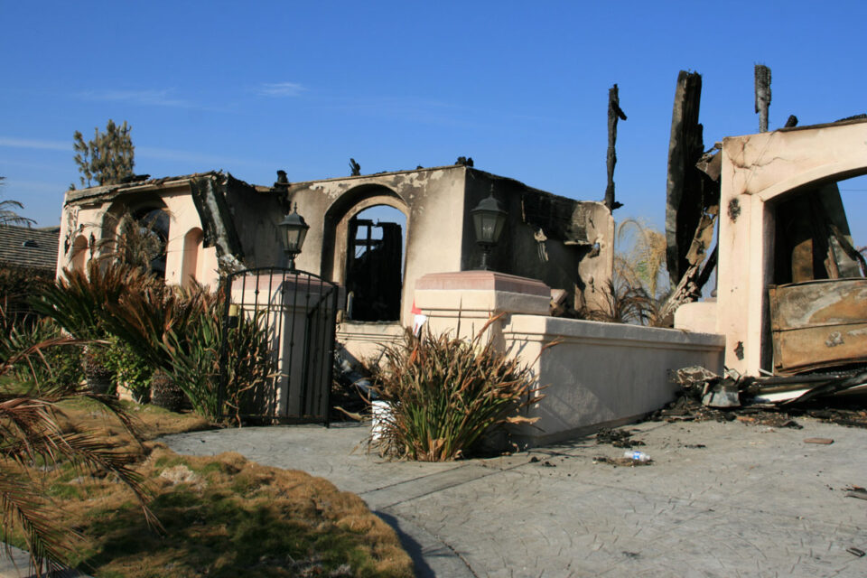 The 2007 Witch Creek Fire damaged homes in Rancho Bernardo. Olivenhain residents, who live in a very high fire hazard severity zone, have long urged the city to update the community's fire evacuation plan. Photo by Kevin Key