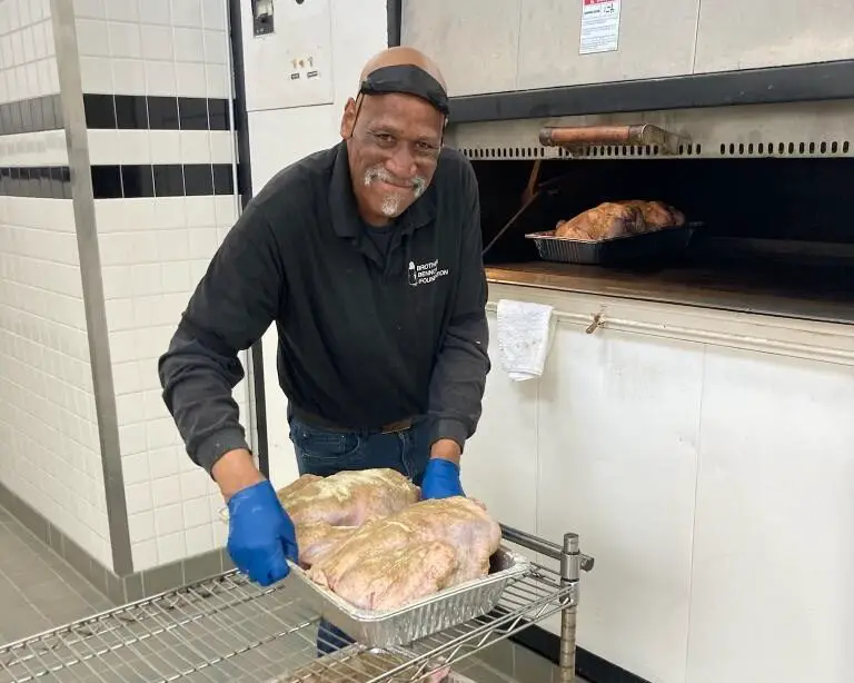 Brother Benno's chef Craig "Pelon" Mercer cooks turkeys for soup kitchen's Thanksgiving Day meal. Courtesy Brother Benno's