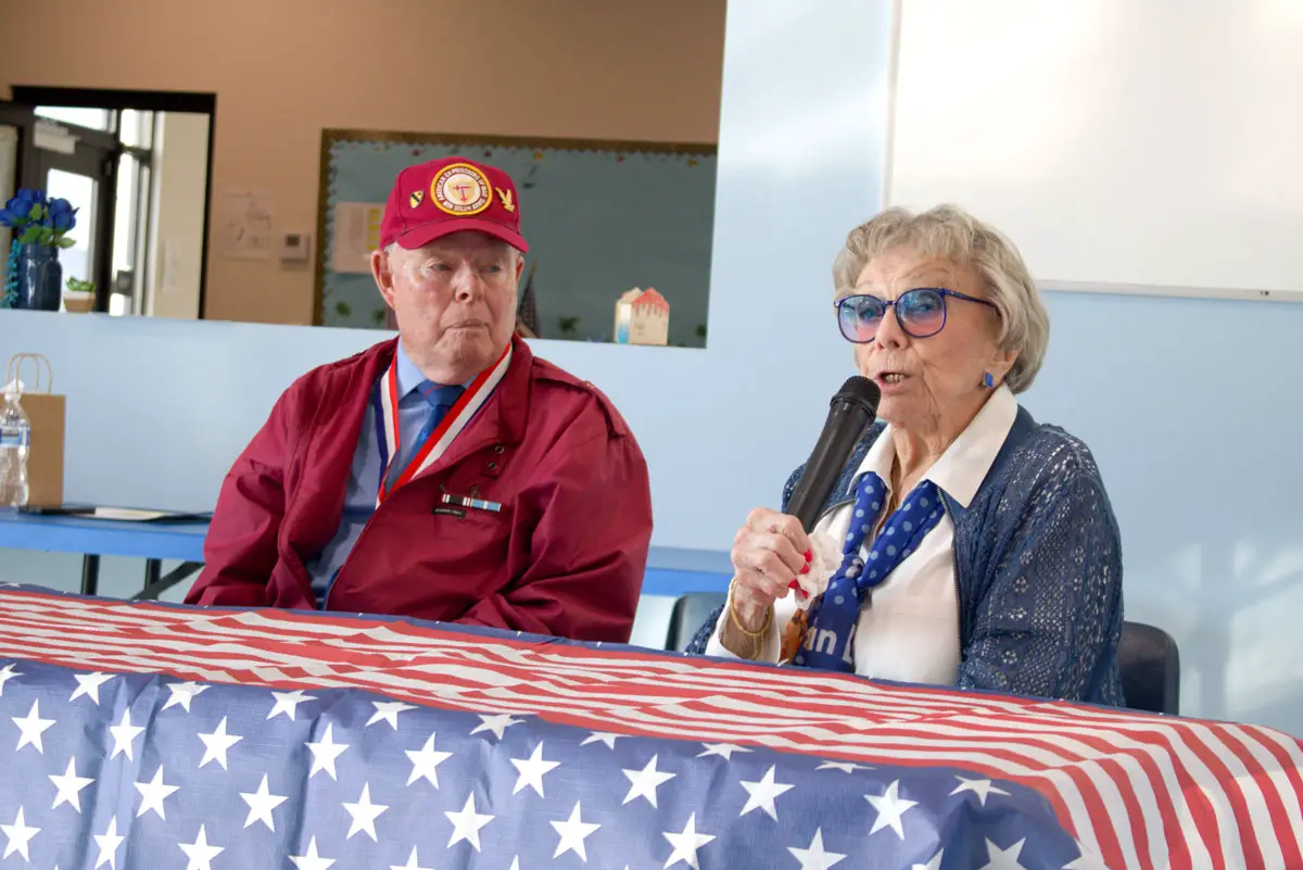 Roberta “Randy” Tidmore speaks to Baypoint Preparatory Academy students on Nov. 14 about her service in the U.S. Marines during World War II, alongside Navy veteran and former prisoner of war Tom Crosby. Photo by Laura Place