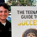 Colton Fidelman shares his new book “The Teenage Guide to Success” with his schoolmates at a book signing event on Dec. 7 at the Army and Navy Academy. Photo by Abigail Sourwine