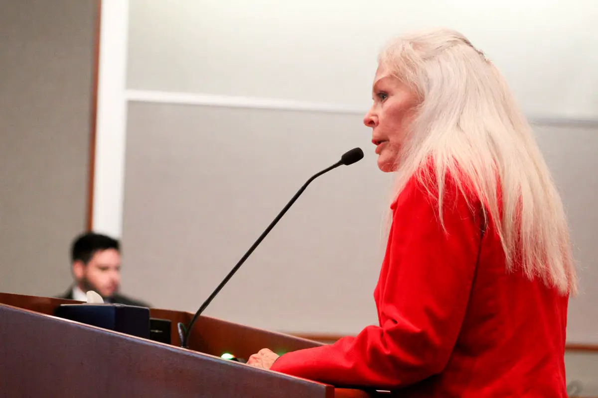 San Marcos resident Becky Garrett speaks in favor of the proposed mixed-use development at the Restaurant Row site. Photo by Laura Place