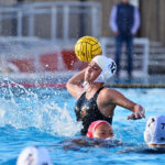 Anisa Anaya, a senior set guard on the Torrey Pines varsity girls water polo team, takes aim during a November match against Cathedral Catholic. Photo by Anna Scipione