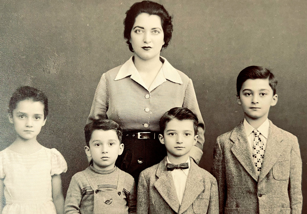 A photo of Michael Salour (bow tie, second from right), with his mother and siblings in Iran. Courtesy photo/Feri Partovi