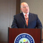 Vista Mayor John Franklin speaks about the 2023 city’s accomplishments during a State of the Community event on Jan. 22 at the Vista Civic Center. Photo by Laura Place