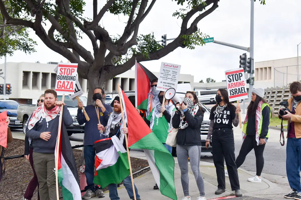 Protesters gathered on Feb. 9 outside Rep. Mike Levin's office in Oceanside protesting the U.S. military's funding of Israel. Photo by Samantha Nelson