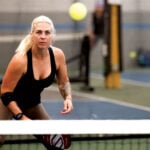 Oceanside resident Michelle plays an indoor pickleball match on Feb. 21 at the Pickleball Club of Carlsbad. The city is building eight new outdoor courts in response to the sport's growing popularity. Photo by Michelle Slentz/The Coast News