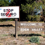 A sign near the Eden Valley welcome sign. Courtesy photo/Stop Seguro