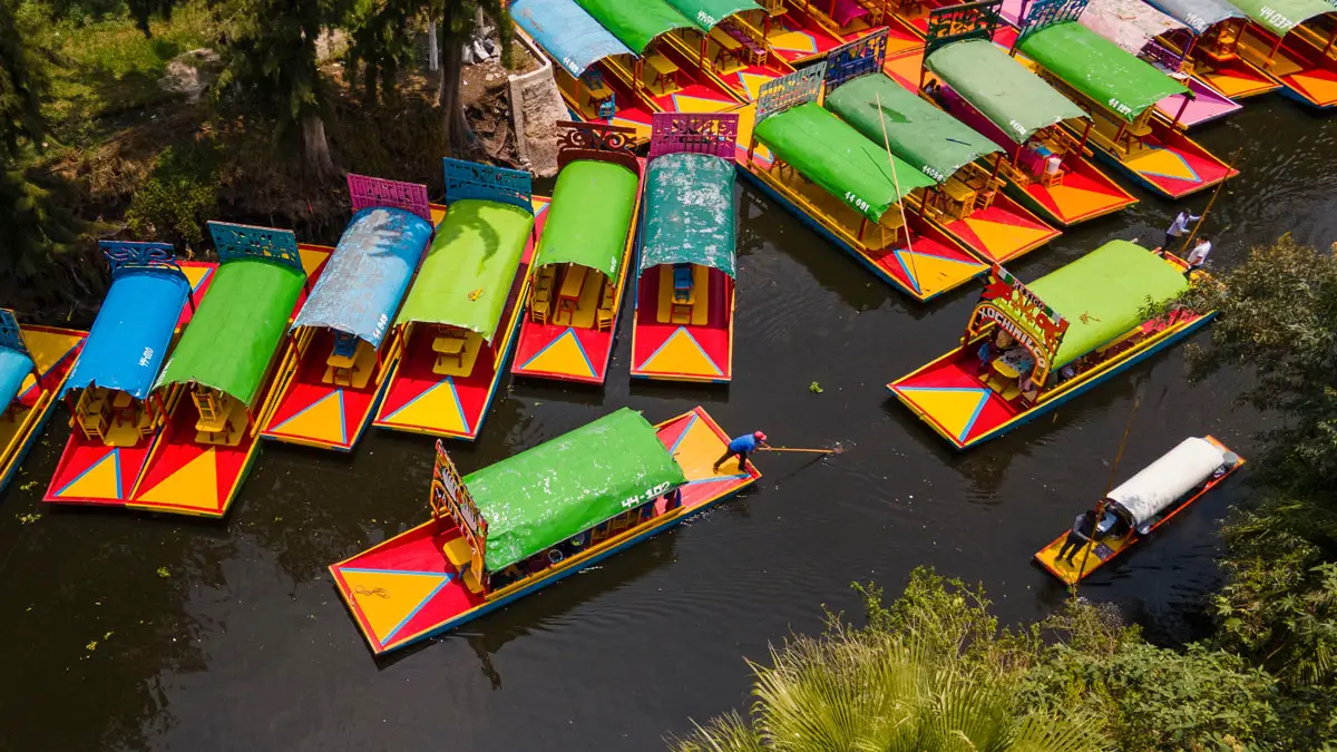 Drift down the narrow canals on trajineras, colorful, gondola-like canoes in Chinampas, or the floating farms of Xochimilco. Courtesy photos