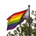 The City of Vista raised the intersectional pride flag outside the Civic Center during a ceremony on Monday morning. This is the third year the city has flown the flag. Photo by Laura Place