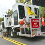 The city's public works employees repaint road markings. Courtesy photo/City of San Marcos