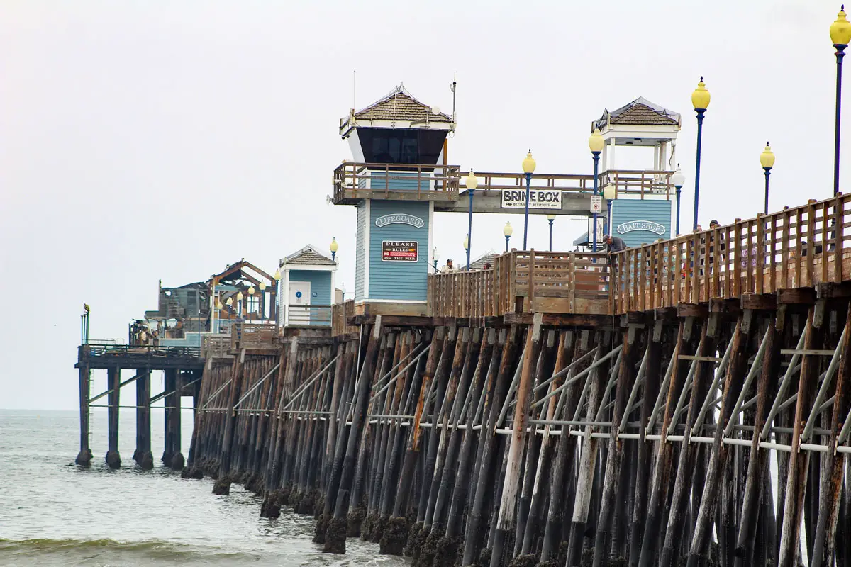 The end of the Oceanside Pier remains closed to the public following the April 25 fire that broke out on the pier’s hammerhead end, destroying the former Ruby’s Diner building and Brine Box seafood kiosk. Photo by Samantha Nelson
