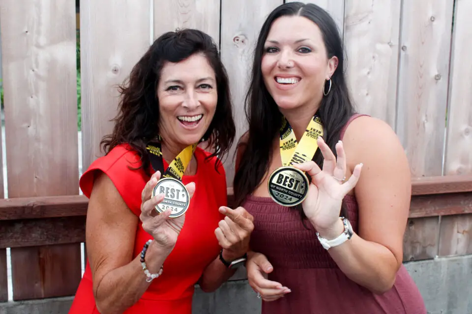 Lisette Hart (left) and Myriah Rincon of Vista's Yoga Branch attended the 2nd annual Best of North County winner’s party on July 17 at The Leucadian Bar. Photo by Chris Kydd