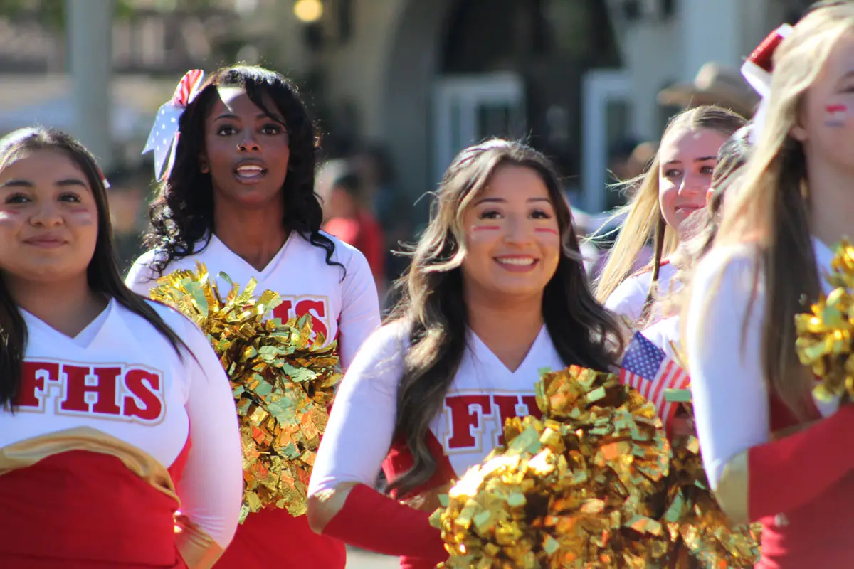 Cheerleaders with Fallbrook High School participate in a Veterans Day Parade on Nov. 11 in Fallbrook. Photo by Samantha Nelson