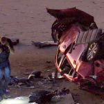 A drive drove over a cliff and landed on the beach in Carlsbad following a police pursuit. Screenshot/ABC10